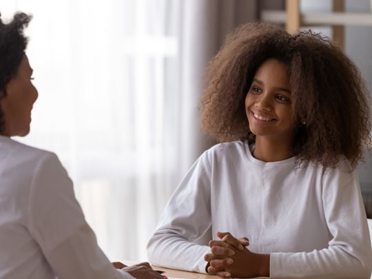 family talking about fostering